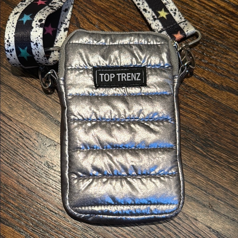 This is a Top Trenz Puffer Cell Bag with an original striped tie-dye strap - Picture 5 of 8